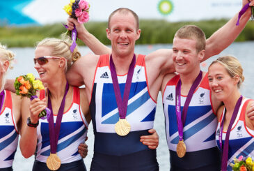 Para-rowing crew with medals