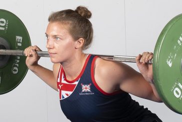 woman doing back squat for strength and power