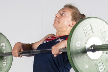 woman lifting weights for strength and power