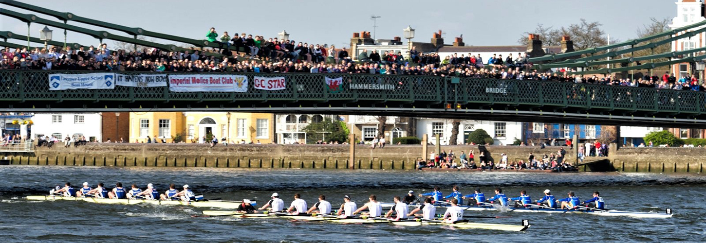 eights racing under Hammersmith Bridge