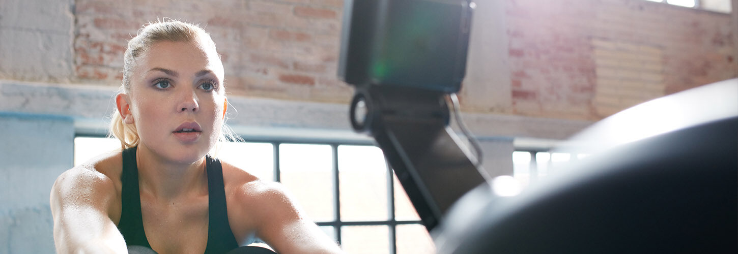 Woman on indoor rower