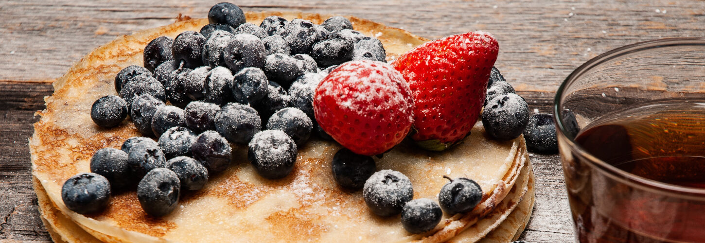 Pancakes with blueberries and strawberries