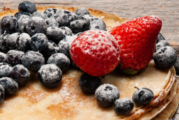 Pancakes with blueberries and strawberries