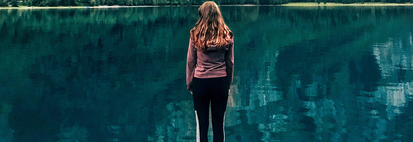 Woman looking at lake
