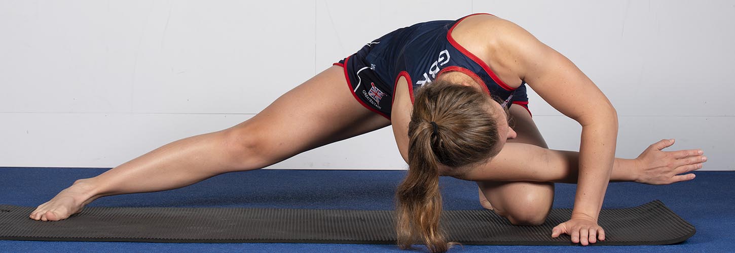 woman doing adductor stretch