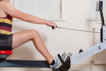 young male showing good posture on ergo