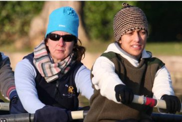 women rowing in beanie hats