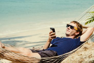 man in hammock on beach