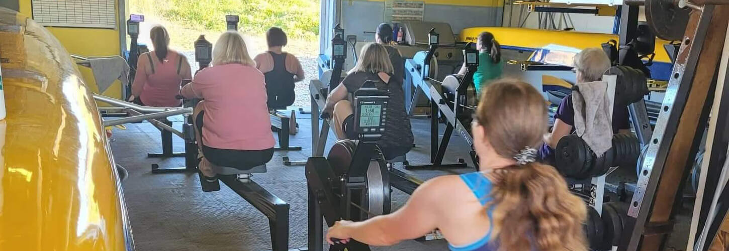 Junior, seniorand masters women on ergos at Eastbourne RC