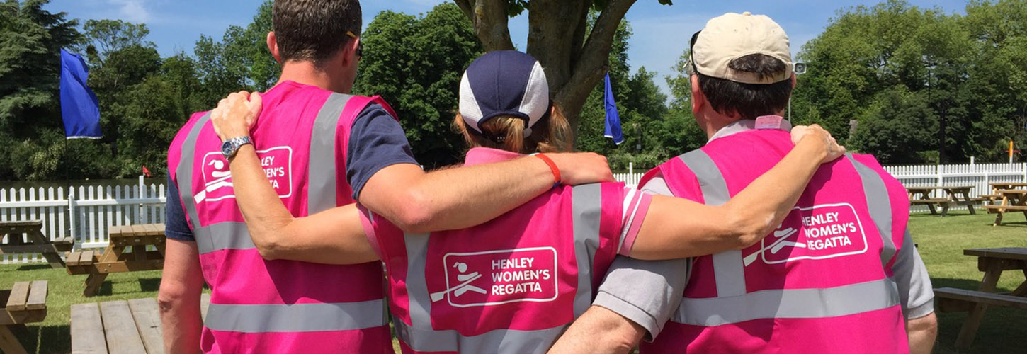3 people in Henley Women's Regatta pink tabards