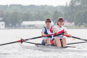 women's pair racing in heavy rain
