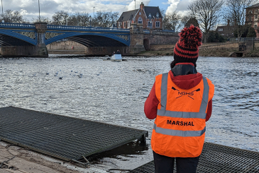 Raft marshal at a successful head race