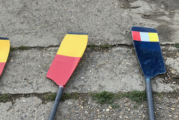 TSS and KCL blades symbolising the two clubs' hosting arrangement