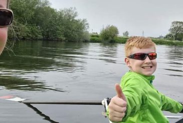Mum and son rowing