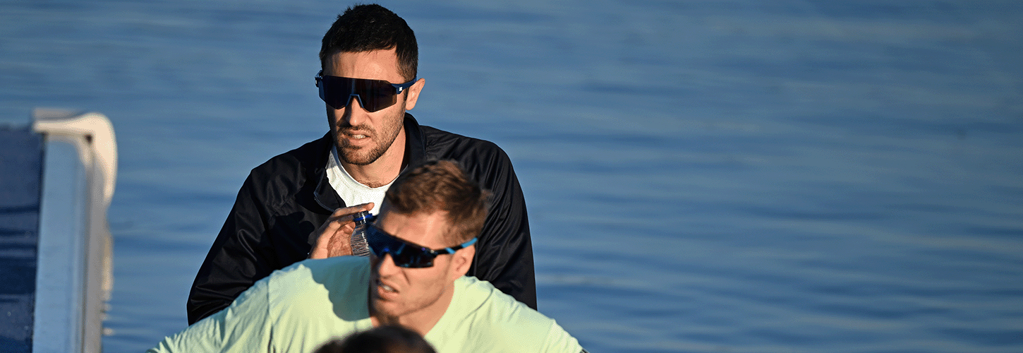 Man focusing at bow of an eight