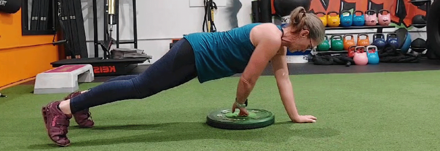 Female Masters rower doing strength training