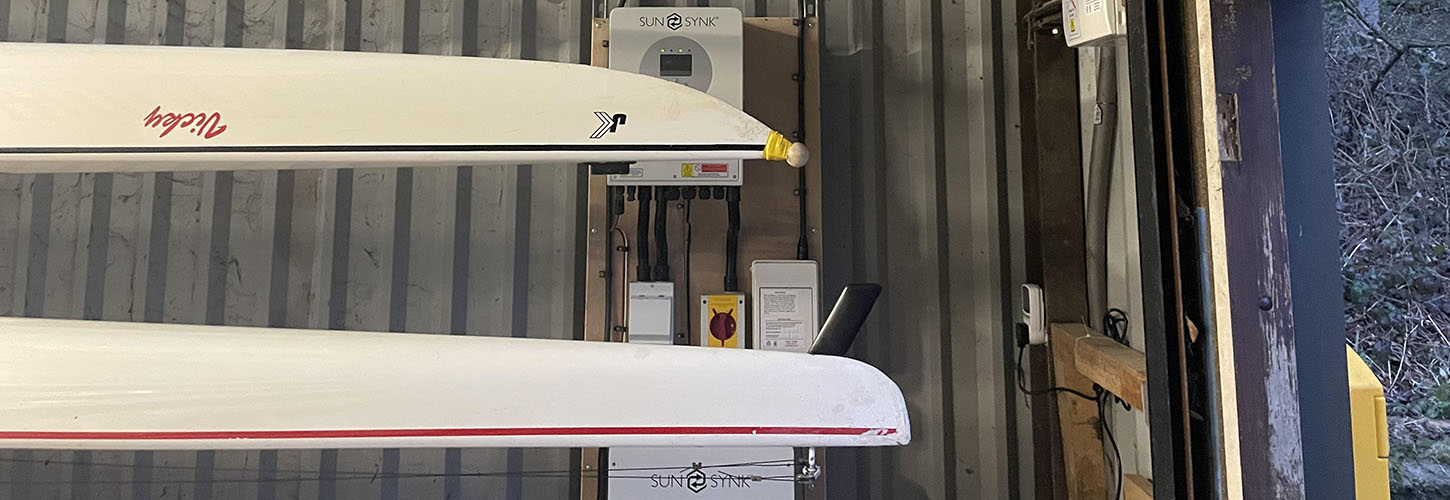 Solar PV control system in corner of boathouse