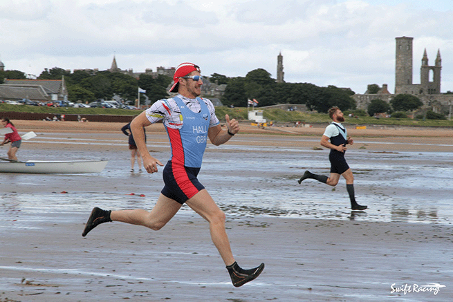 an example of what to wear for coastal sculling including neoprene booties