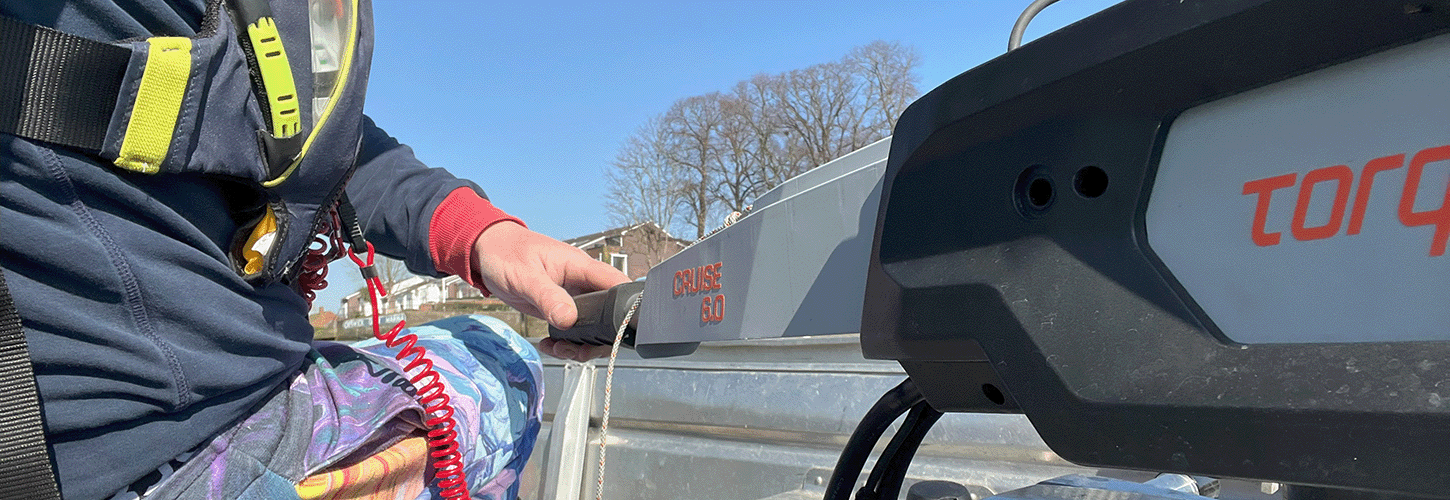 electric outboard motor on a coaching launch
